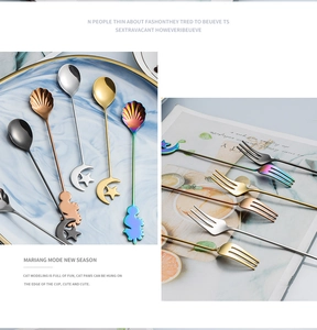 Close-up of shell, moon star and cat themed 304 stainless steel dessert spoons and forks