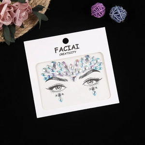 Macro view of crystal face jewels and acrylic rhinestones for eye makeup and forehead