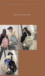 Detail showing various colors of nylon waterproof backpacks with cute decorative pendants