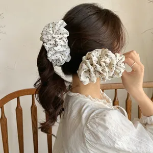 Polka dot and floral ruffled cloud scrunchies for elegant hair styling for women