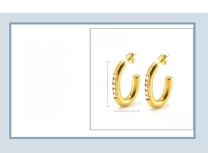 Detailed view of C-shaped 18K gold plated stainless steel earrings with pearl inlay