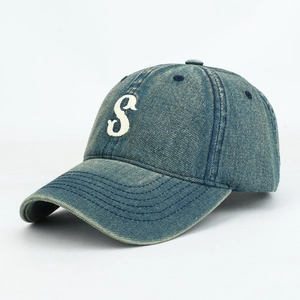 Close-up of the vintage washed denim baseball cap with 3D letter S embroidery details