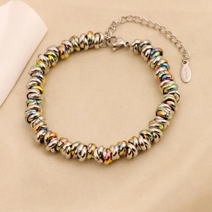 Detail of the colorful beads and stainless steel circles on a chic hip-hop men's bracelet