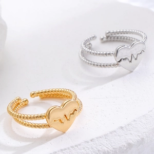Adjustable twist band heart rings with EKG pulse engraving in gold and silver finish