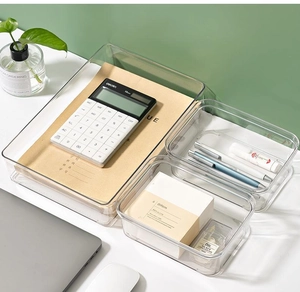 Macro detail of high-transparency PET drawer organizers for office desktop storage