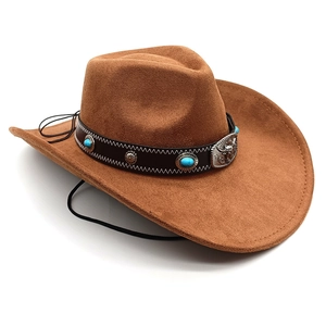 Close-up of brown western cowboy hat featuring turquoise studs and a bull head metal buckle