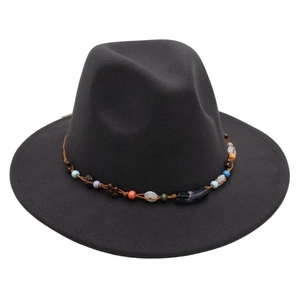 Detail of black wool fedora with bohemian colorful beaded band and wooden floral accents