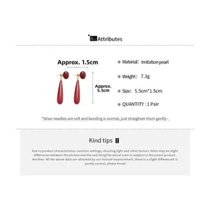 Detailed spec view of 18k gold plated burgundy pearl drop earrings with size measurements