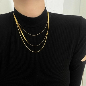 Three-layer gold titanium steel necklace for women featuring minimalist tiered pendants