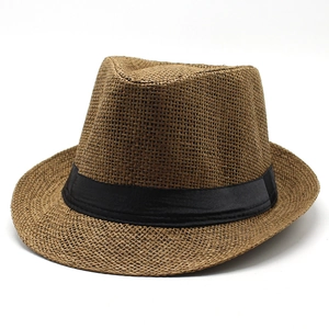 Classic brown straw fedora sun hat with a black satin ribbon band on white background