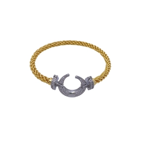 18K gold plated moon woven bracelet with diamond-encrusted horseshoe clasp on white backdrop