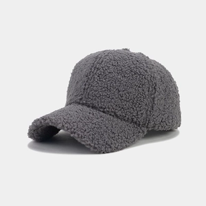 Detailed close-up showing the soft plush texture of this dark grey sherpa baseball cap