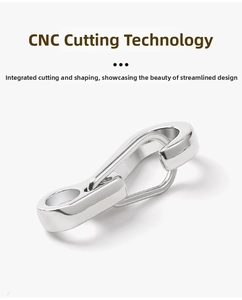 Macro detail of CNC cut stainless steel EDC spring hook with a polished metallic finish