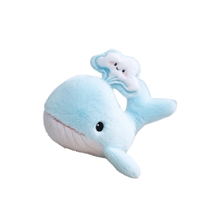 Cute blue whale plush toy with white cloud blowhole and soft fabric on white background