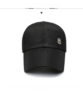 Close-up of black breathable mesh baseball cap with Sport shield embroidery and long brim