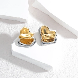 Minimalist two-tone irregular textured heart stud earrings with gold and silver finish
