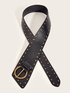 Close-up of black leather belt with three rows of gold rivets and a round buckle