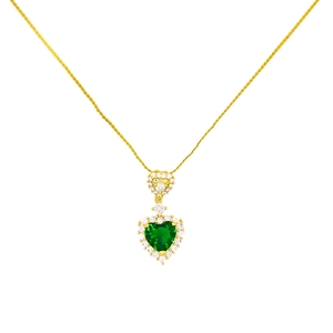 Exaggerated vintage necklace with green heart emerald pendant and gold chain