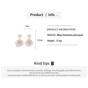 Infographic showing gold snowflake earrings size 3x5.5cm with rhinestones and white pom-poms