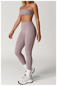 Detail of high-waist yoga set in smoky pink with butt-lifting seams and elastic fabric