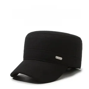 Detailed macro view of black winter cadet cap with a metallic fashion plate and warm fabric