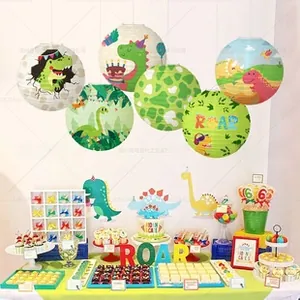 Dinosaur theme party set featuring colorful paper lanterns and matching dessert table decor