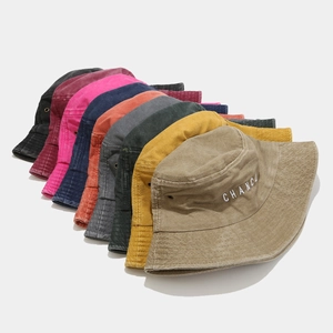 Multiple colors of washed cotton bucket hats with CHANCE embroidery for outdoor sun protection