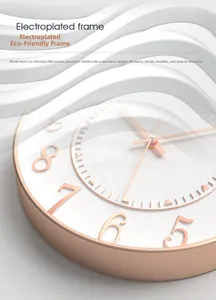Detail of rose gold 3D embossed numerals on white dial with ABS frame wall clock