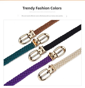 Detailed view of colorful woven belts with gold pin buckles in brown black green white