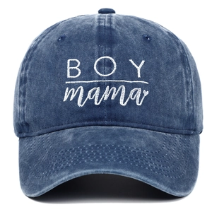 Detail of BOY mama embroidery on washed navy cotton denim baseball cap with curved brim