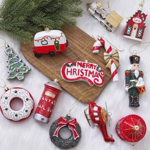Christmas tree ornaments set with Santa mailbox and wreath on white faux fur background