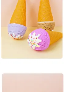 Detail of multi-colored PVC ice cream cones with faux cream and colorful sprinkles