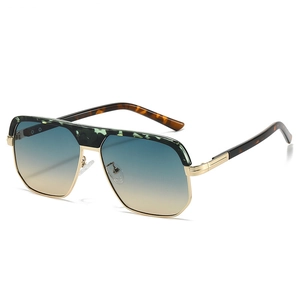 Flat top aviator sunglasses with gold frames and gradient blue yellow lenses in 45-degree view