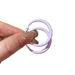 Minimalist purple glossy round hoop earrings with silver pins for a stylish summer look