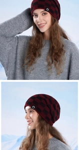 Detail of red and black checkered knit beanie with warm lining on a model