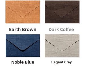 Detailed close-up showing four colors of mini envelopes with elegant linen paper texture