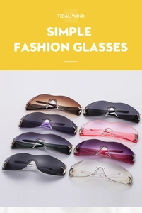 Close-up of rimless Y2K pilot sunglasses with star metal rivets and gradient colorful lenses