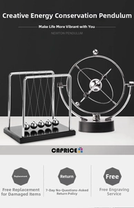 Macro shot of stainless steel Newton's cradle and kinetic perpetual motion desk toy
