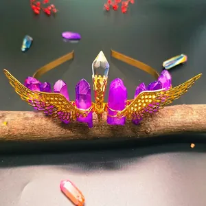 Macro detail of natural crystal crown with golden wings and purple quartz clusters