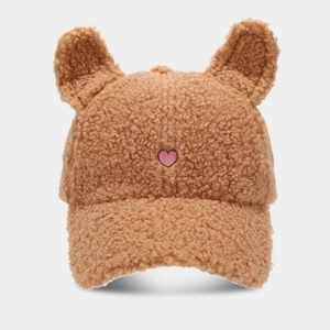 Detail of plush brown baseball cap featuring cute bear ears and pink heart embroidery