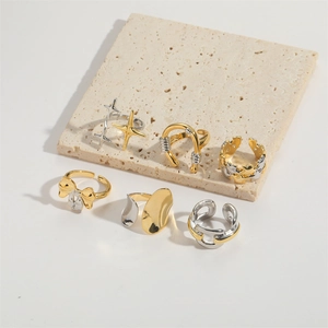 U-shaped star and bow double-layer open rings in gold and silver finish on stone