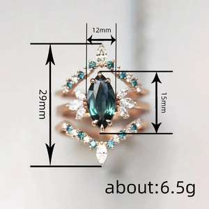 Vintage-Ring-Set aus Roségold mit blaugrünem Saphir im Marquiseschliff und Diadem-Design
