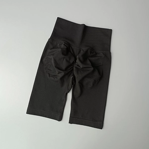 Detail view of high waist seamless gym shorts with scrunch butt lifting effect in black