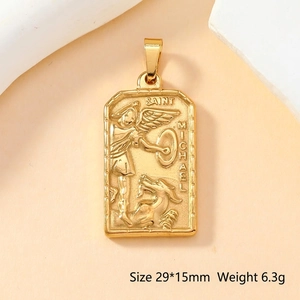 Macro view of gold Saint Michael pendant featuring 29x15mm dimensions and 6.3g weight