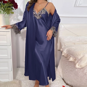 Women's dark blue satin sleepwear set featuring a long lace-trimmed nightgown and matching robe