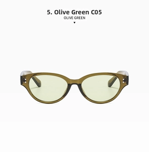 Detail of olive green cat eye sunglasses with silver rivets and translucent green lenses
