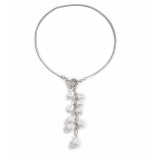 Detail of silver snake chain necklace featuring baroque pearl tassels in a vintage style