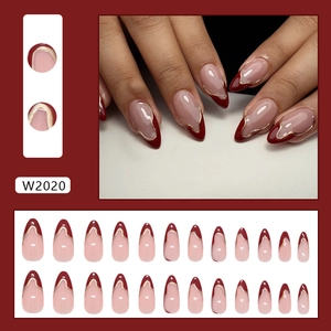 French red tip press on nails with gold wavy trim and 24-piece almond shape almond nail kit