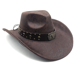 Close-up of brown western cowboy hat with embossed snake texture and bull head metal buckle
