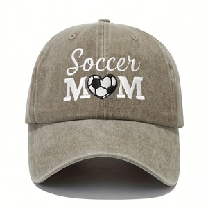 Close-up of Soccer MOM embroidery with heart-shaped football on washed cotton baseball cap